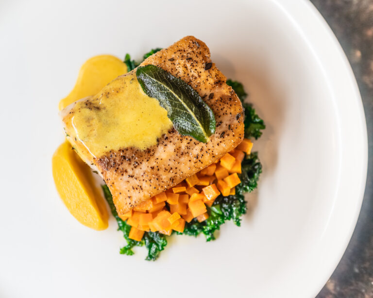 mahi mahi coconut curry served with roasted root vegetables and basmati rice