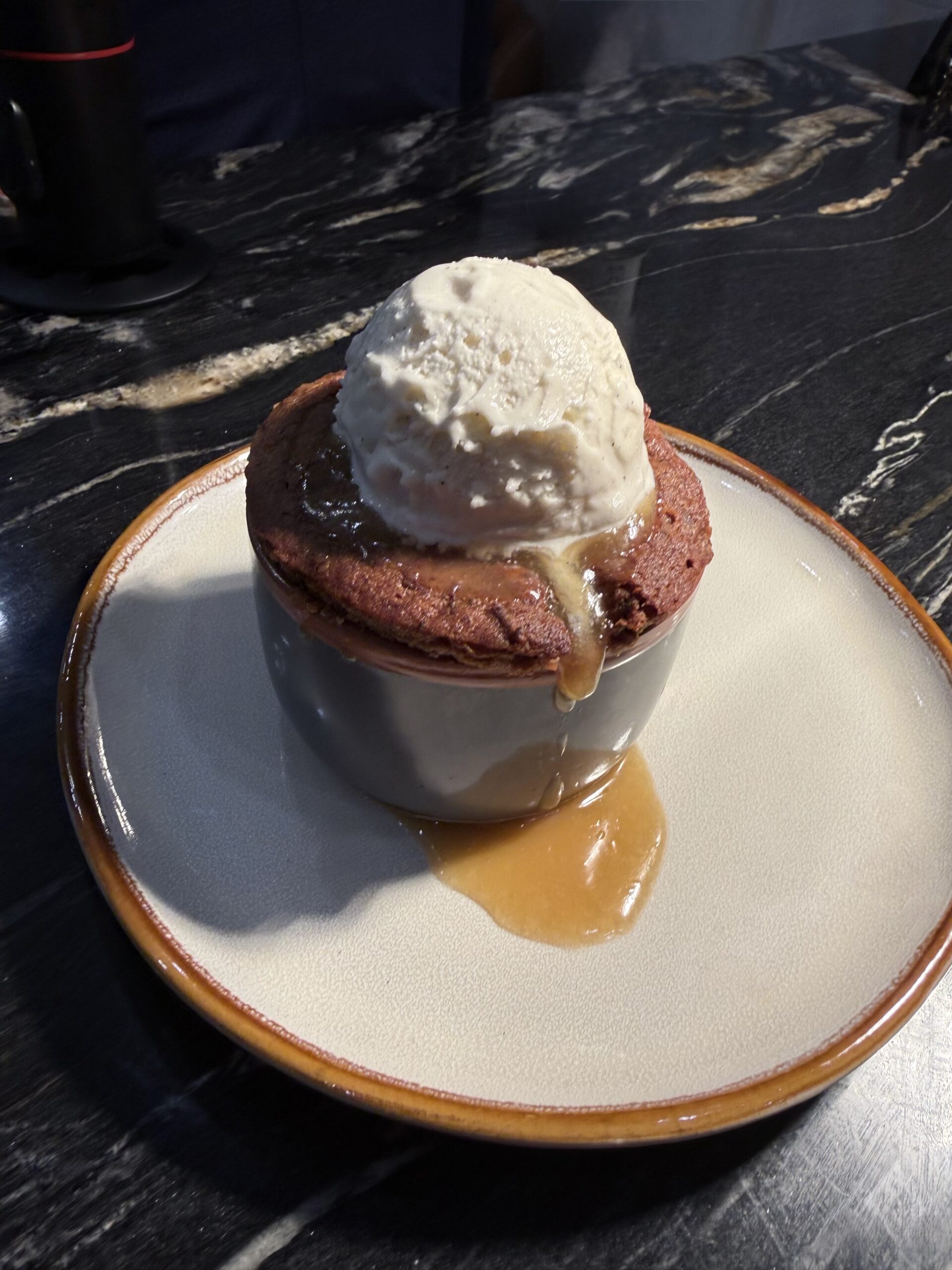 Sticky toffee pudding with vanilla ice cream