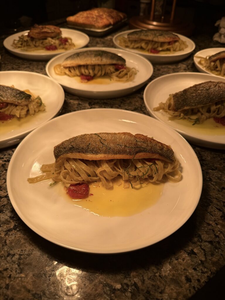 pan seared branzino recipe with fresh tagliatelle and tomato confit